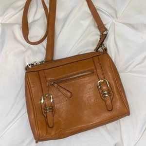 Charming Charlie adjustable tan cross body bag
